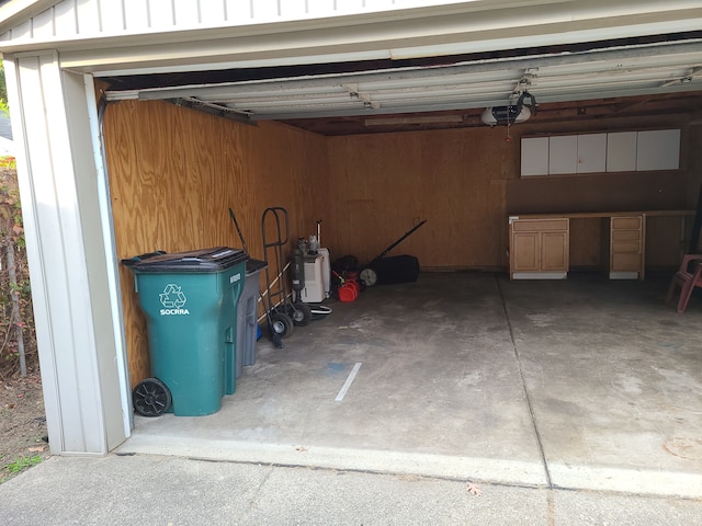 garage featuring a garage door opener