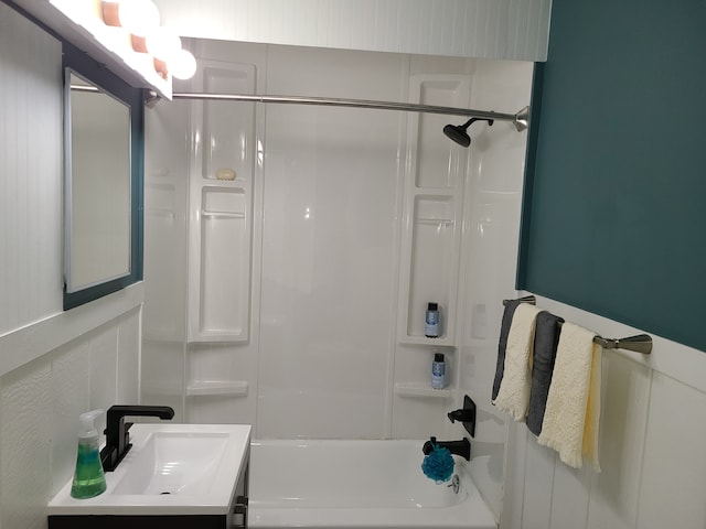 bathroom featuring tub / shower combination and vanity