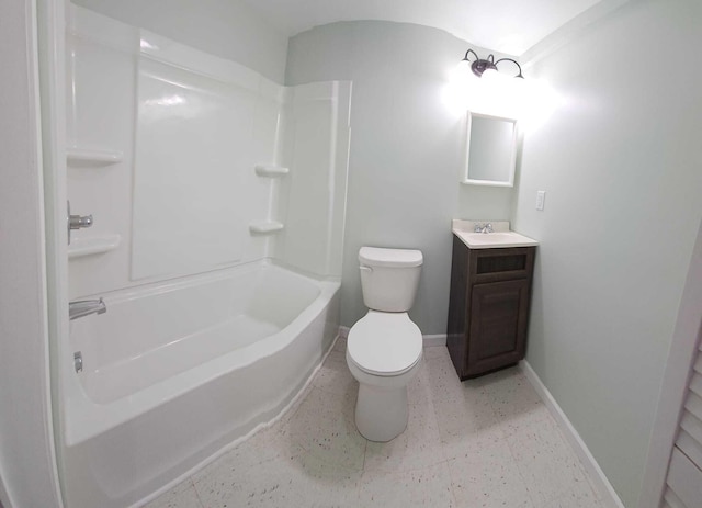 full bathroom featuring washtub / shower combination, vanity, and toilet