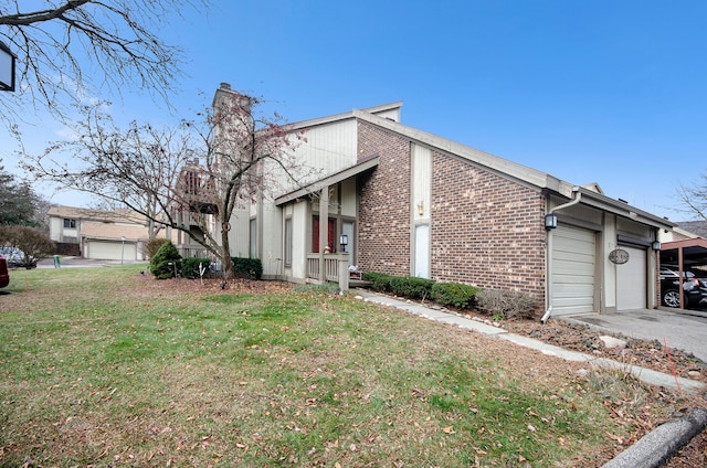 view of home's exterior featuring a garage and a lawn