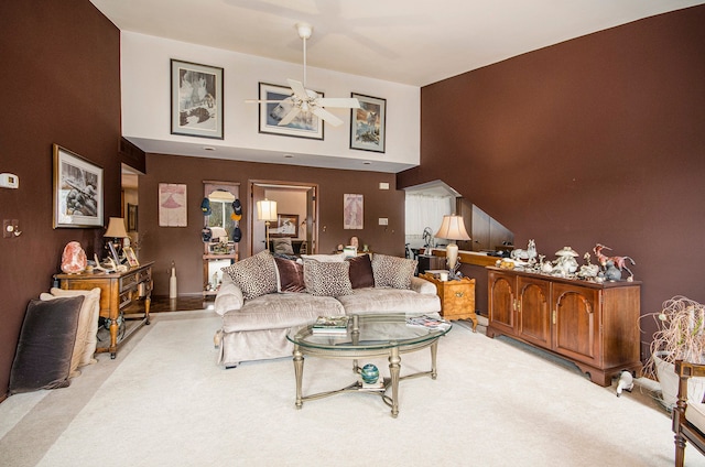 living room featuring ceiling fan and light carpet