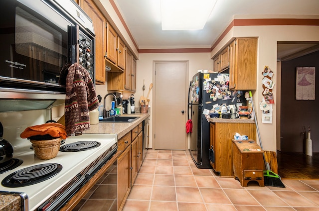 kitchen with sink, light tile patterned flooring, ornamental molding, and black appliances