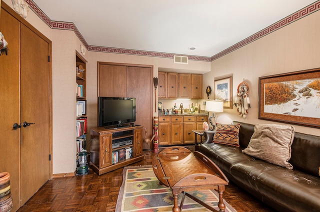 living room with dark parquet floors