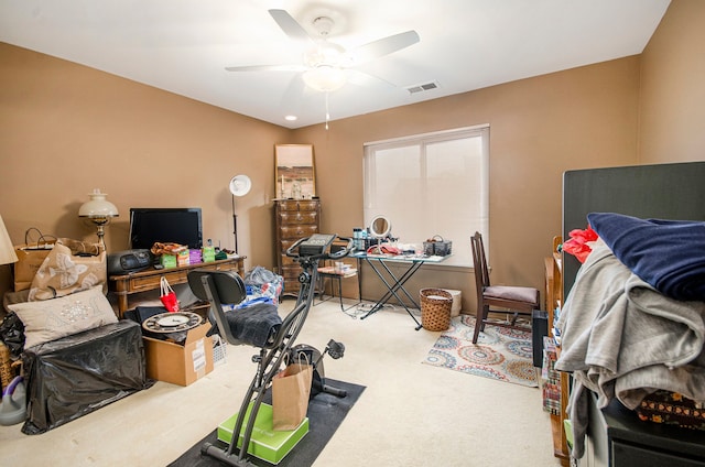 office space with carpet flooring and ceiling fan