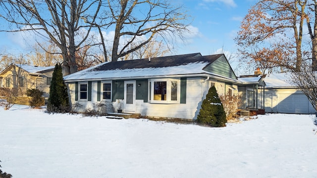 view of front of property featuring a garage