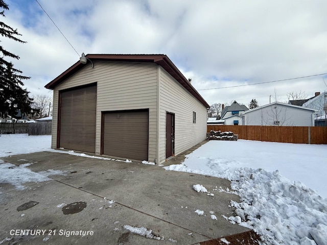 view of snow covered garage