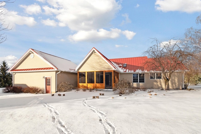 ranch-style home with a sunroom