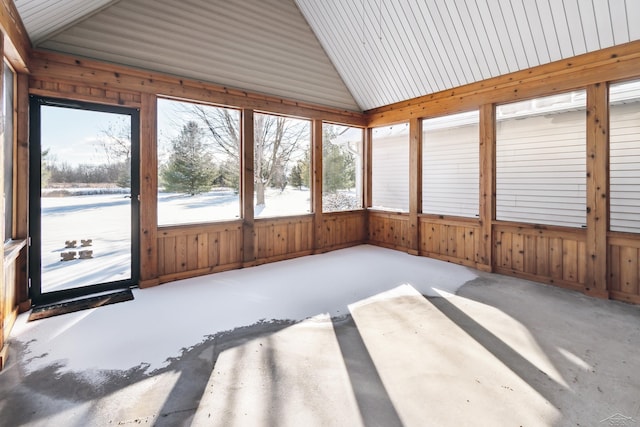 unfurnished sunroom with vaulted ceiling