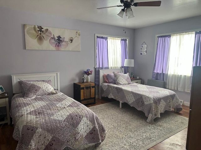 bedroom featuring ceiling fan and wood-type flooring