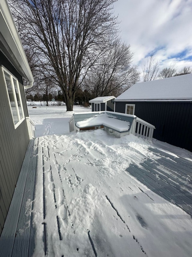 view of snow covered deck