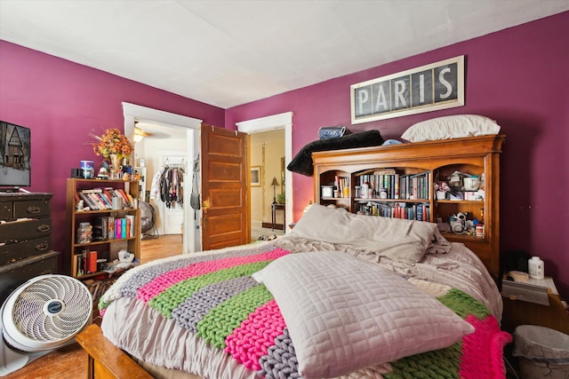 bedroom with hardwood / wood-style flooring