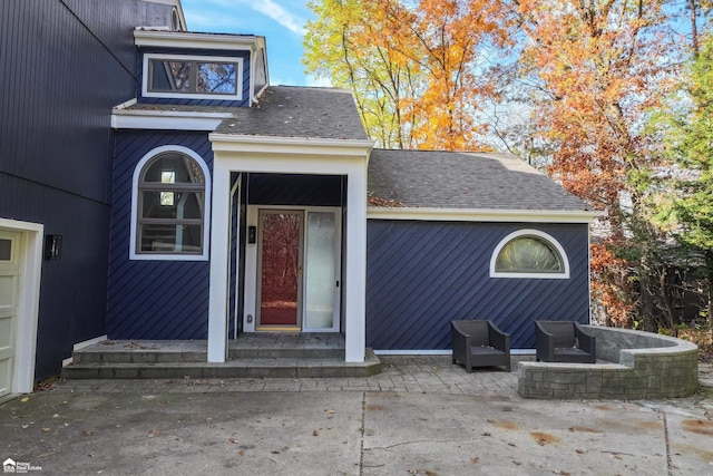 property entrance with a patio area