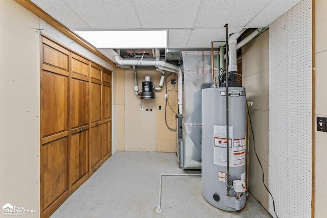 utility room featuring gas water heater