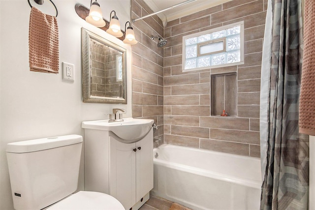 full bathroom featuring toilet, vanity, and shower / bath combo with shower curtain