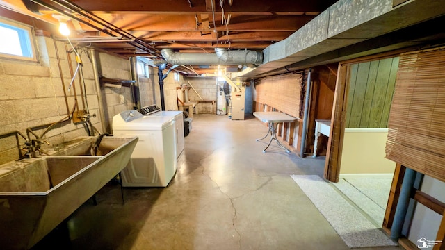 basement with separate washer and dryer and heating unit