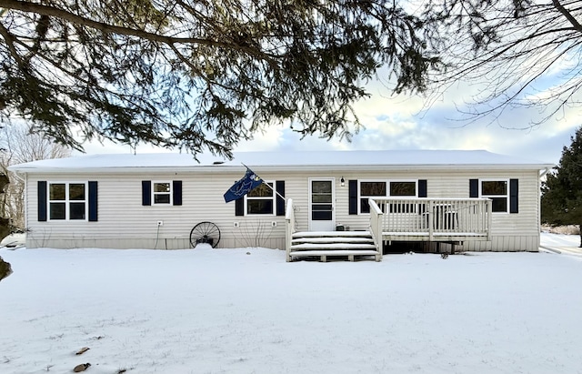 view of front of home with a deck