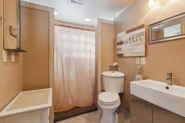 bathroom with a shower with shower curtain, vanity, and toilet