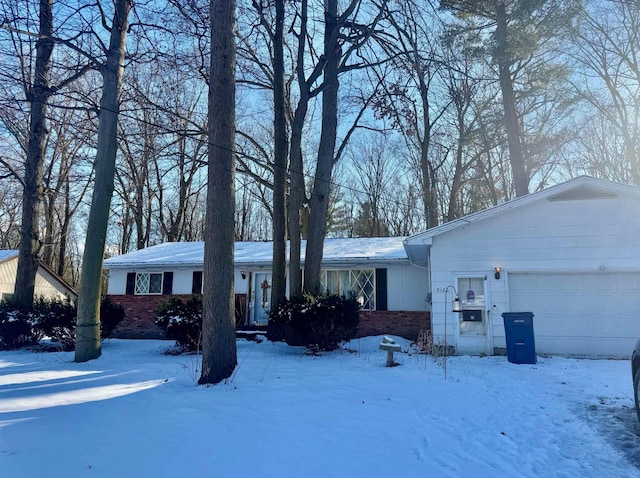 single story home featuring a garage