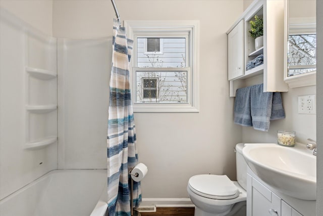 full bathroom with toilet, shower / bath combination with curtain, and vanity