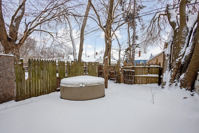 view of yard covered in snow