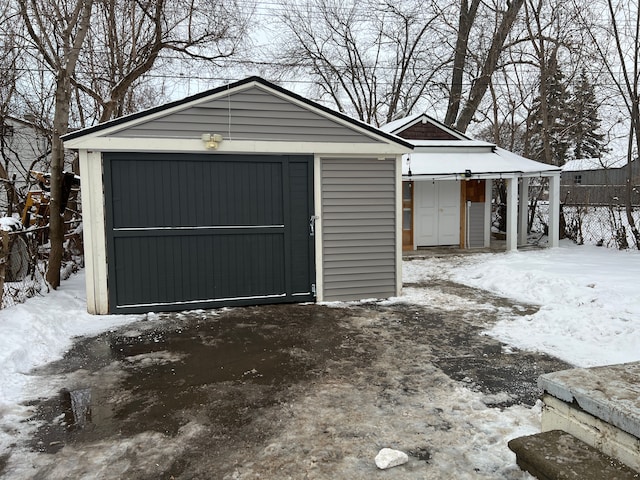 view of snow covered garage