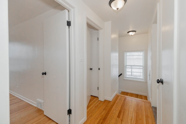 hallway featuring light hardwood / wood-style floors