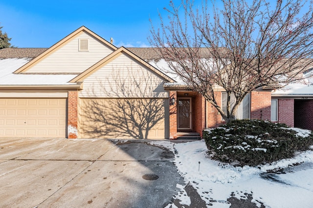 view of front of property with a garage