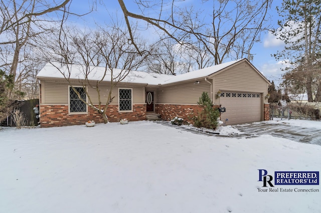 single story home with a garage