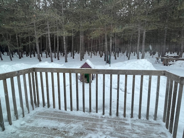 view of snow covered deck