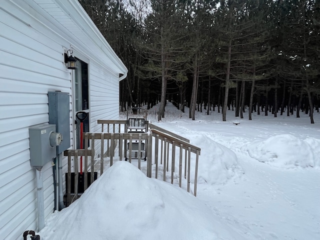 view of yard layered in snow