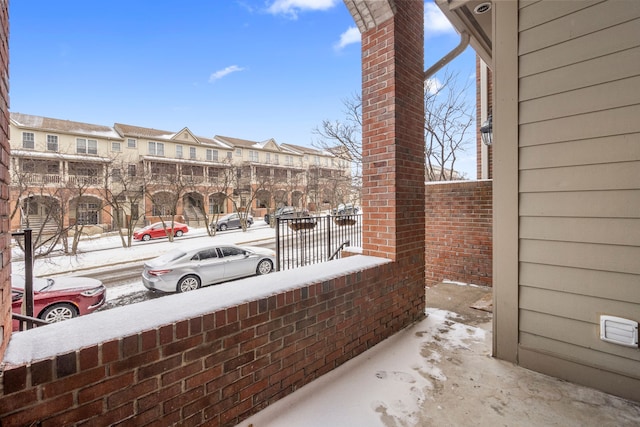 view of snow covered patio