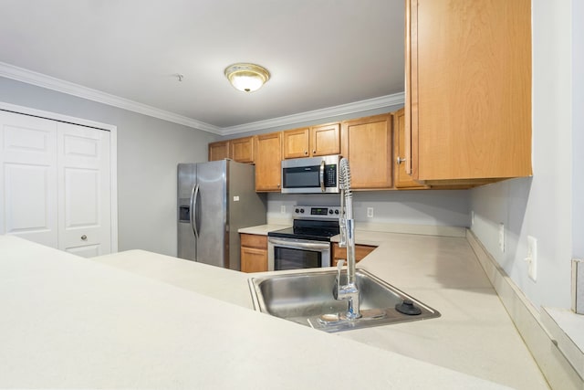 kitchen featuring sink, ornamental molding, and appliances with stainless steel finishes