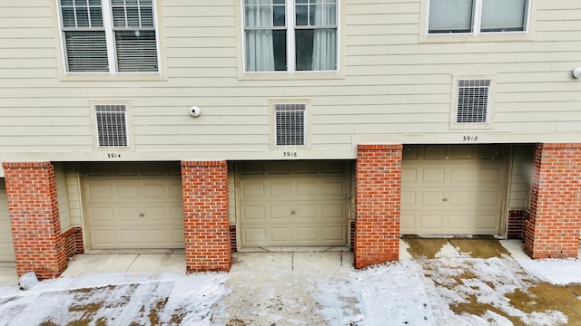 view of snow covered garage