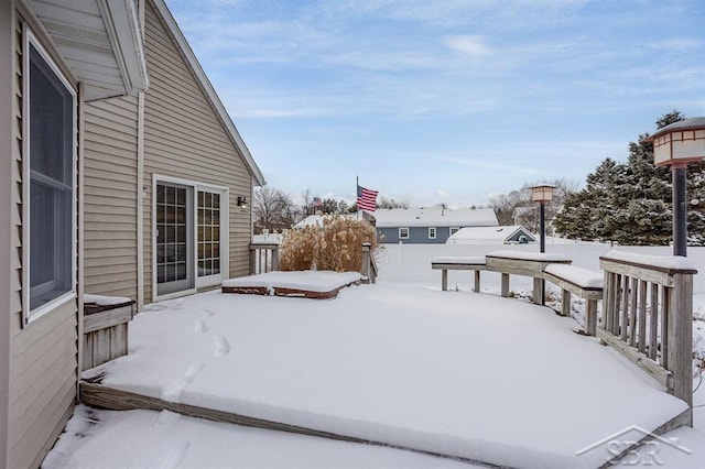 view of yard layered in snow