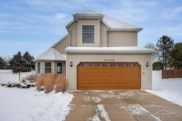 front facade with a garage