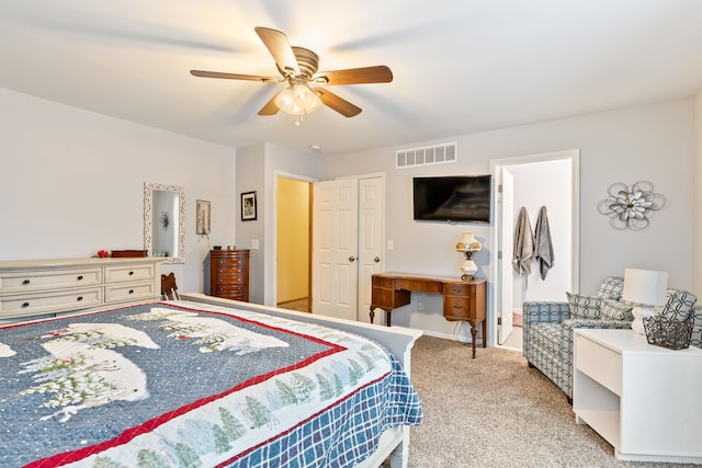 bedroom featuring light carpet and ceiling fan