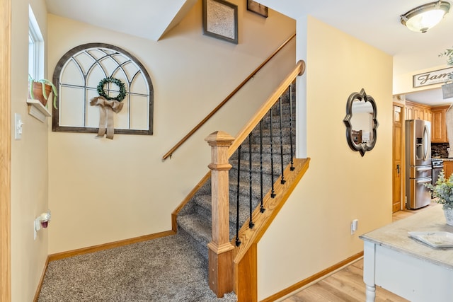 stairway with carpet floors