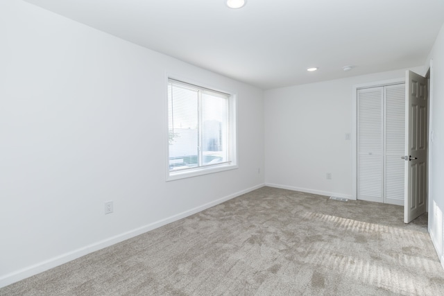 view of carpeted spare room