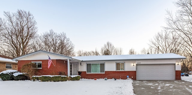 single story home with a garage