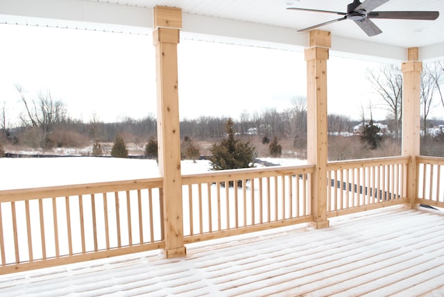 snow covered deck with ceiling fan