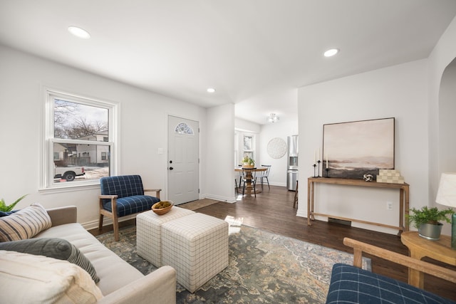 living room featuring dark hardwood / wood-style floors