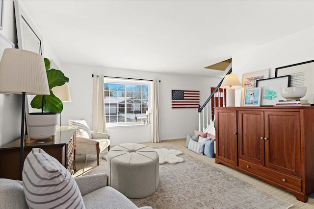 sitting room with light colored carpet