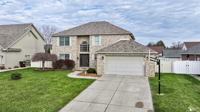 view of front property with a front lawn and a garage