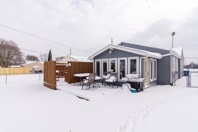 view of snow covered property