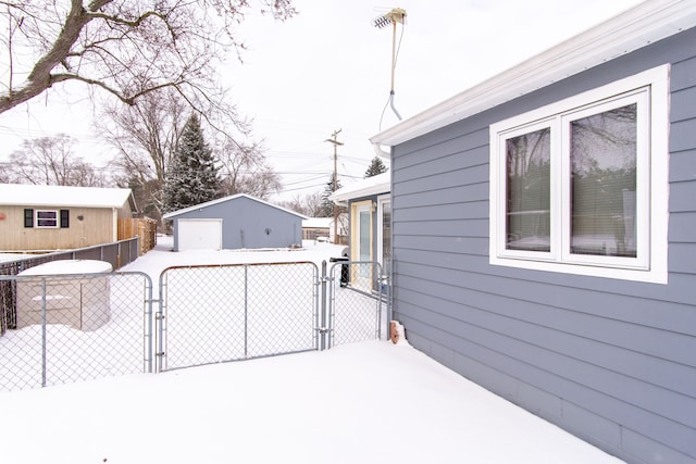 exterior space with an outbuilding and a garage