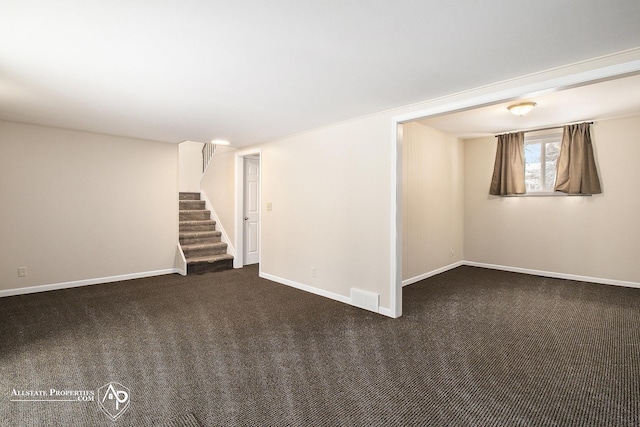 basement with stairs, carpet floors, and baseboards