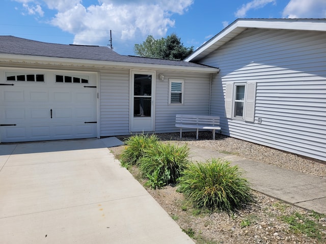 entrance to property with a garage