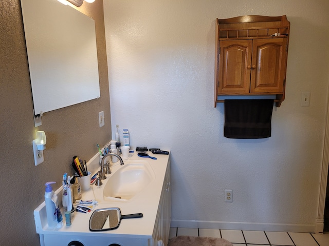 bathroom featuring tile patterned floors and vanity