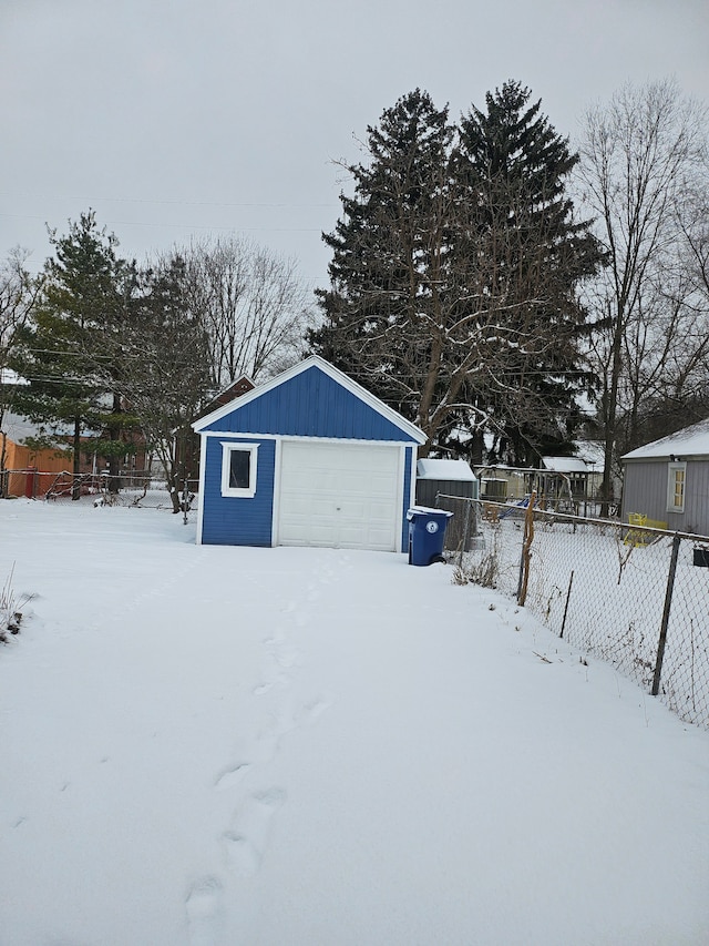 view of snow covered garage