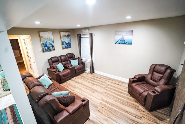 living room with light hardwood / wood-style floors